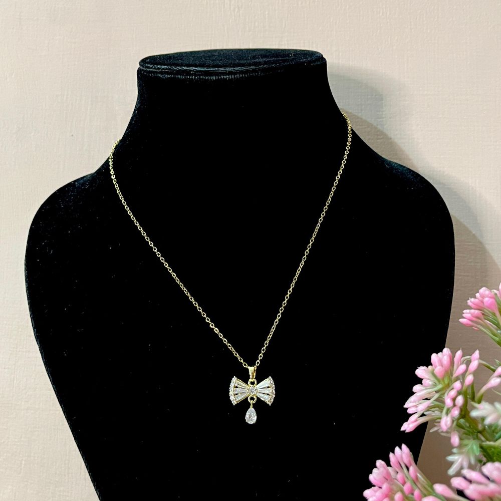 ECW GOLD BOW DROP DAINTY NECKLACE image 1