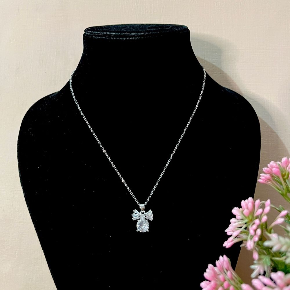 ECW SILVER BOW DROP DAINTY NECKLACE image 1